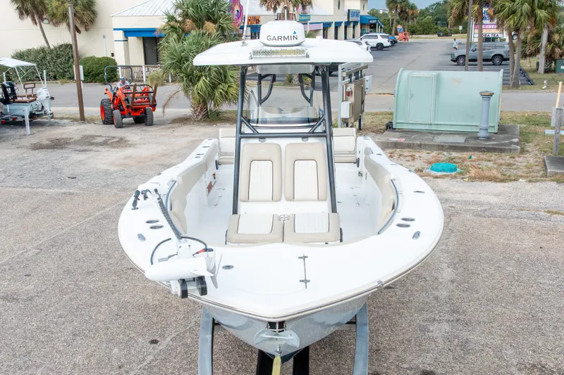 Slide: The Image of 2016 Sea Fox 288 Commander boat with Garmin equipment, parked outdoors. - 5