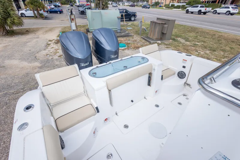 Slide: The Image of 2016 Sea Fox 288 Commander boat with twin 300 horsepower engines and spacious seating. - 48