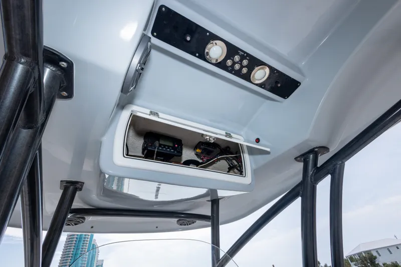 Slide: The Image of 2016 Sea Fox 288 Commander boat console with open electronics compartment. - 29