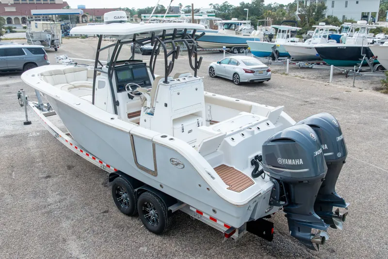 Slide: The Image of 2016 Sea Fox 288 Commander boat with dual Yamaha engines on a trailer. - 64