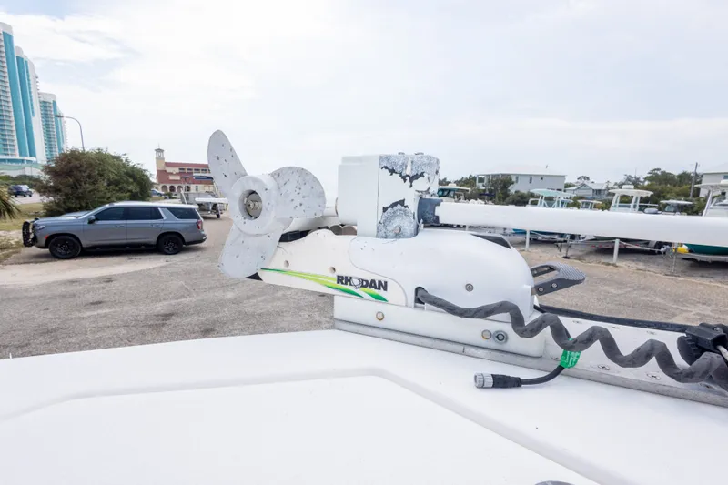 Slide: The Image of Bow of 2016 Sea Fox 288 Commander with trolling motor in a marina setting. - 39