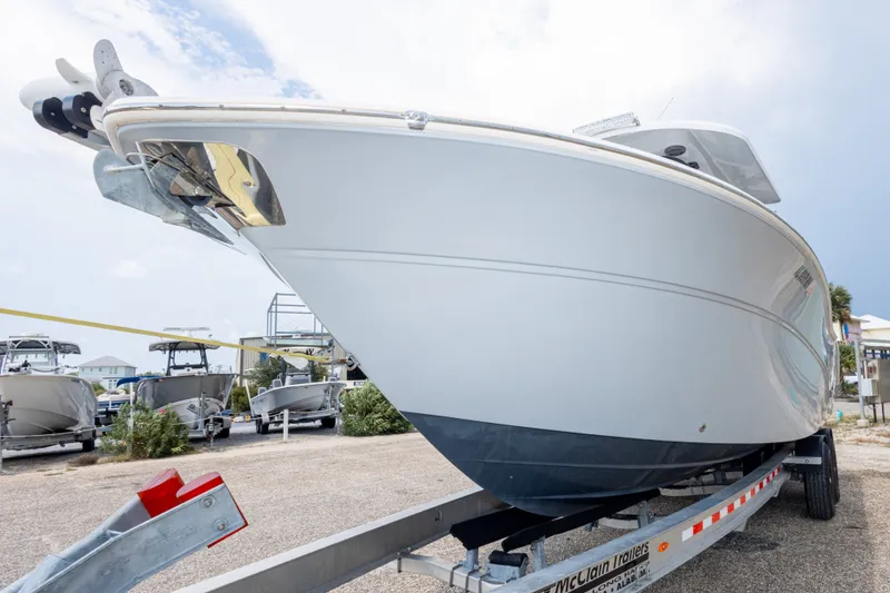 Slide: The Image of 2016 Sea Fox 288 Commander boat on trailer, displayed outdoors. - 20