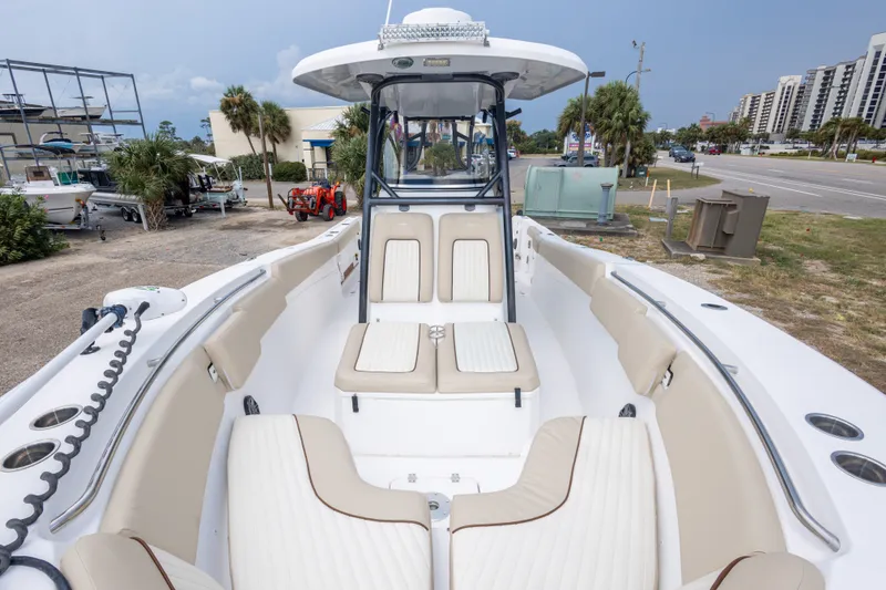 Slide: The Image of 2016 Sea Fox 288 Commander boat interior with cushioned seating and modern design. - 37
