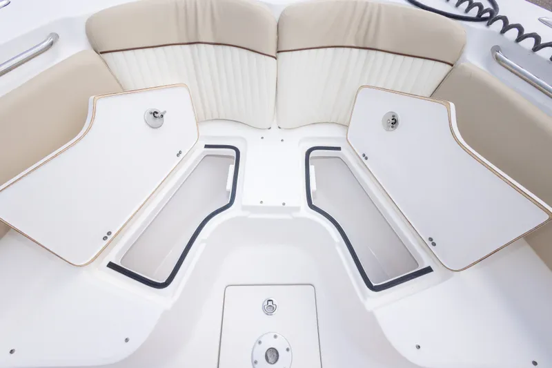 Slide: The Image of Interior view of 2016 Sea Fox 288 Commander boat with open storage compartments. - 41