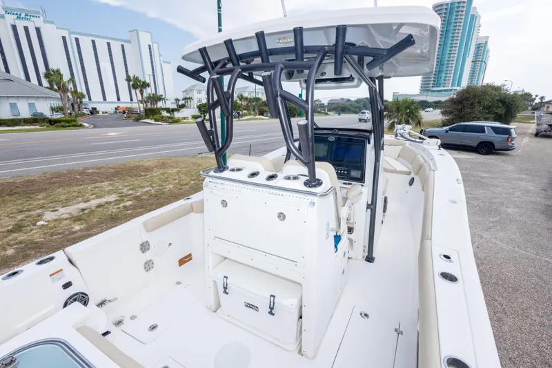 Slide: The Image of 2016 Sea Fox 288 Commander boat with spacious deck and modern console. - 21