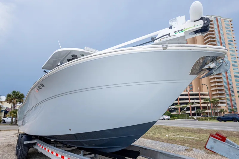 Slide: The Image of 2016 Sea Fox 288 Commander boat on trailer, urban background. - 19