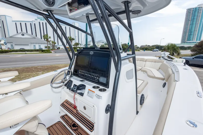 Slide: The Image of 2016 Sea Fox 288 Commander boat interior with modern dashboard and seating. - 25