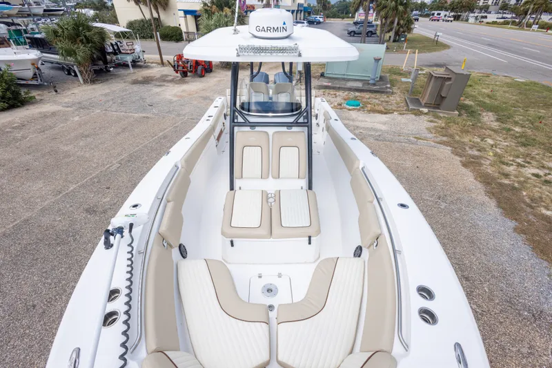 Slide: The Image of 2016 Sea Fox 288 Commander boat with Garmin equipment, featuring spacious seating and sleek design. - 36