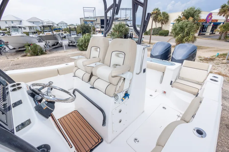 Slide: The Image of 2016 Sea Fox 288 Commander boat interior with dual seats and steering wheel. - 46
