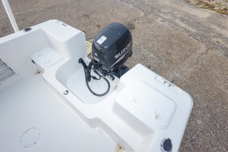 Slide: The Image of 2011 PROLINE 21 CC SE boat with Suzuki outboard motor, viewed from above. - 15