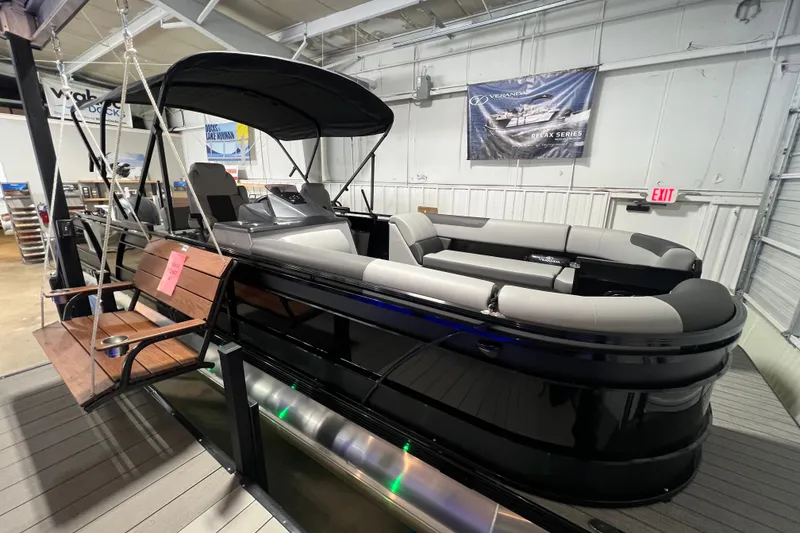 The Image of 2026 Veranda VR 265 VL pontoon boat displayed indoors with seating and canopy. - 0