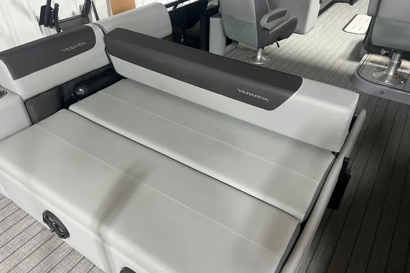 Slide: The Image of Luxurious seating on 2026 Veranda VR 265 VL pontoon boat, featuring sleek gray upholstery. - 13