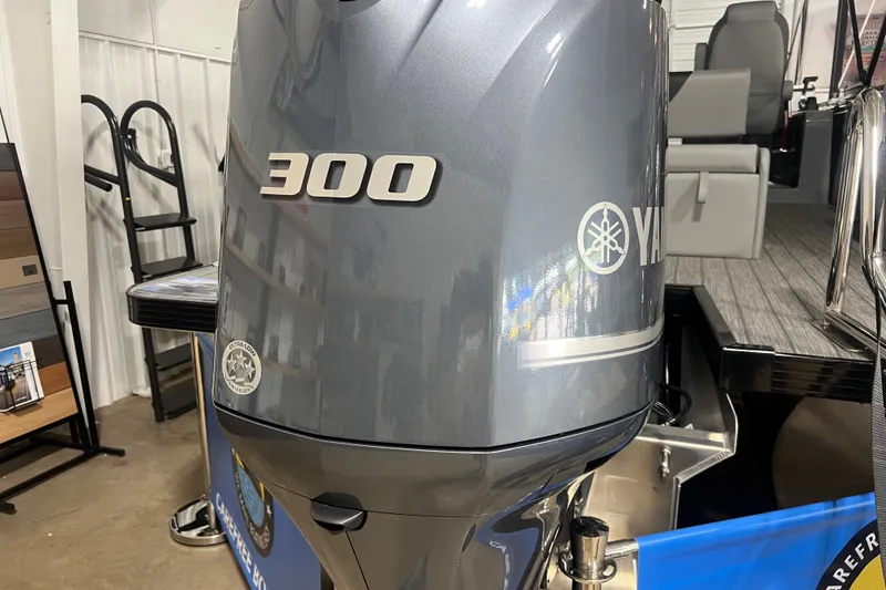 Slide: The Image of 2026 Veranda VR 265 VL with Yamaha 300 outboard motor in showroom display. - 11