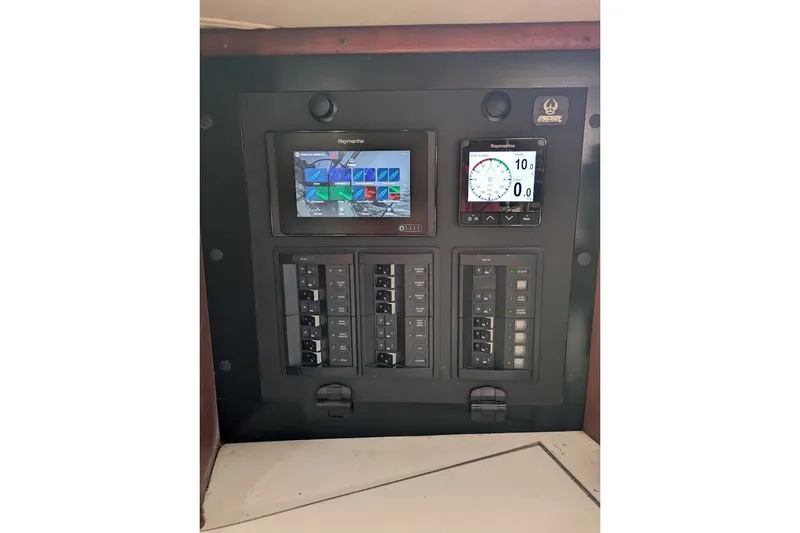 Slide: The Image of Control panel of a 1988 Ericson 38-200 sailboat with Raymarine displays. - 19