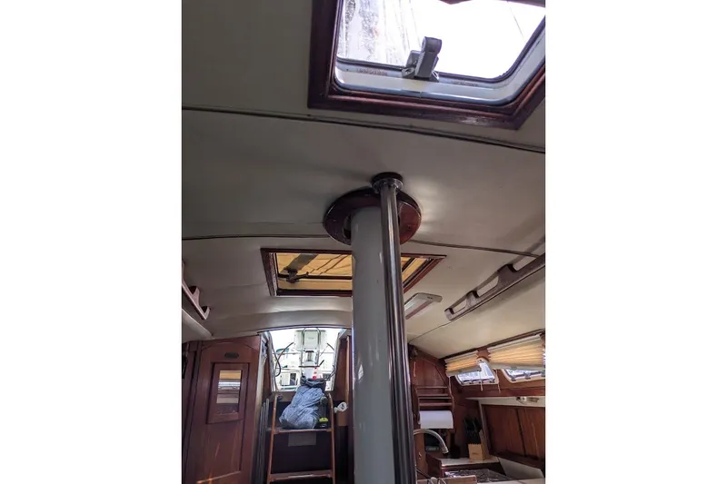 Slide: The Image of Interior of 1988 Ericson 38-200 sailboat, featuring cabin details and skylight. - 47