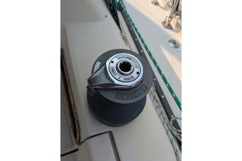 Slide: The Image of Winch on 1988 Ericson 38-200 sailboat deck, featuring Barient branding. - 29