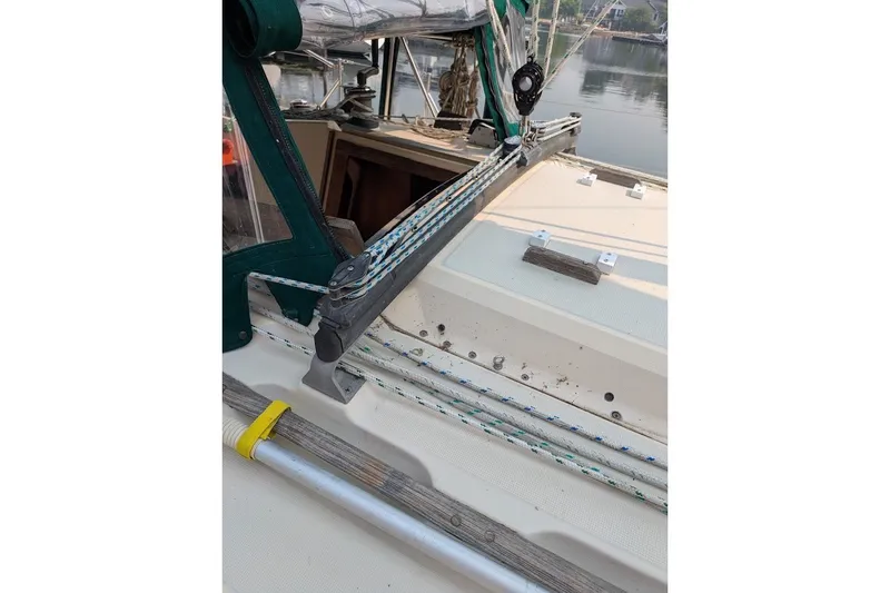 Slide: The Image of 1988 Ericson 38-200 sailboat deck with rigging and cockpit details. - 25