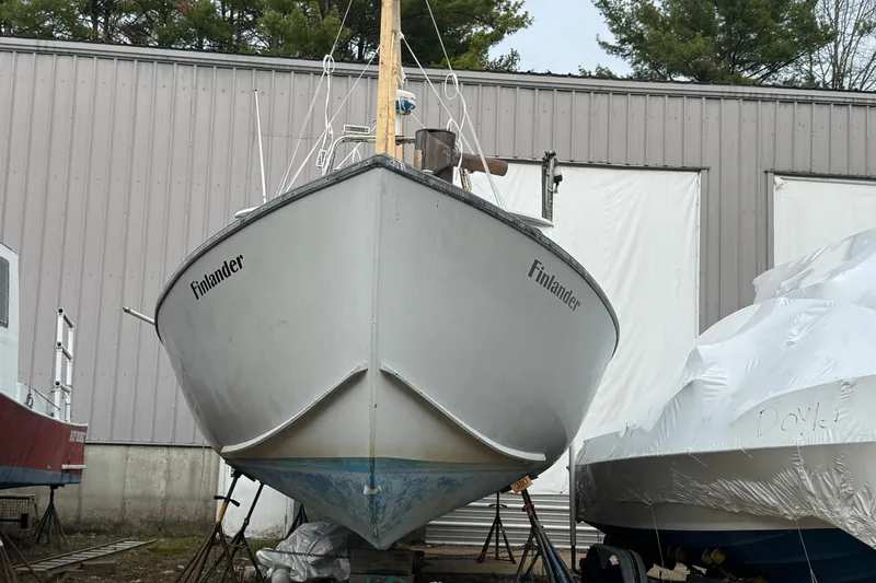 Slide: The Image of 2007 Northern Bay 36 boat named "Finlander" in storage, front view. - 4