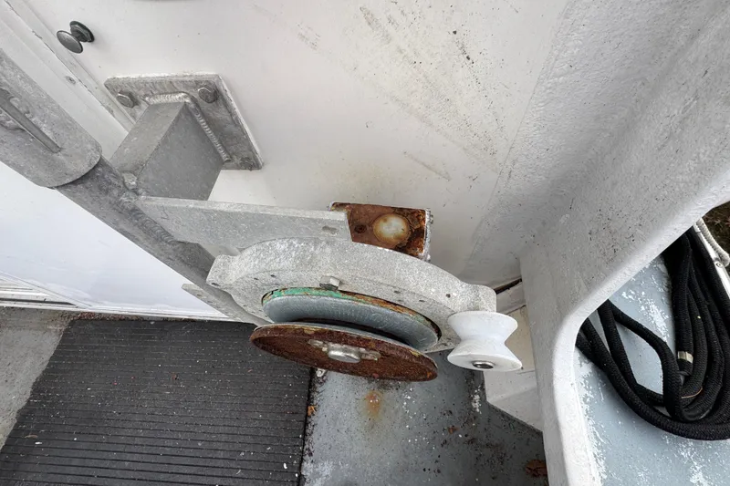Slide: The Image of Rusty winch mechanism on a 2007 Northern Bay 36 boat deck. - 16