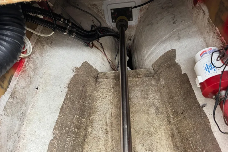 Slide: The Image of Bilge area of a 2007 Northern Bay 36 boat, showing wiring and components. - 38