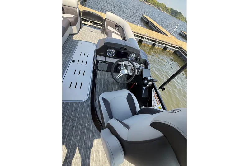 Slide: The Image of Interior view of 2027 Premier 250 Sunsation boat with modern helm and seating. - 5