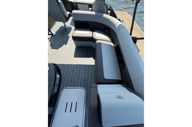 Slide: The Image of Premier 250 Sunsation 2027 boat interior with sleek seating and modern design. - 6