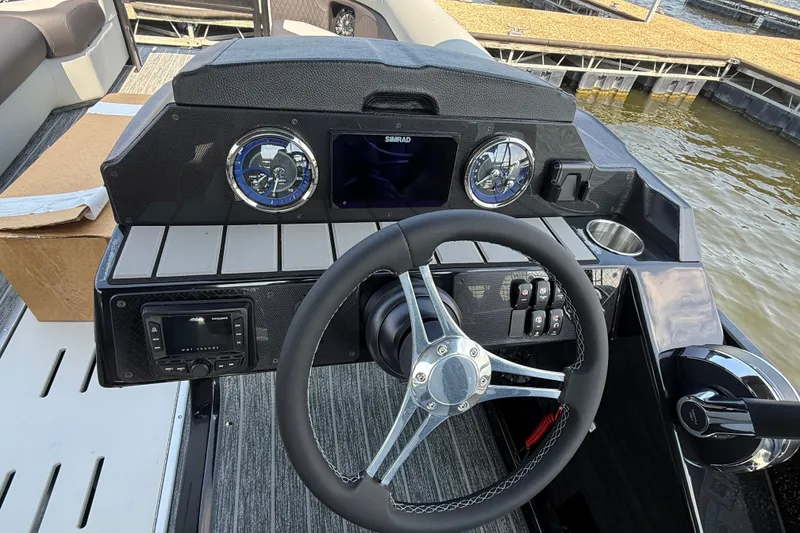 Slide: The Image of Steering console of 2027 Premier 250 Sunsation boat with modern controls and gauges. - 4