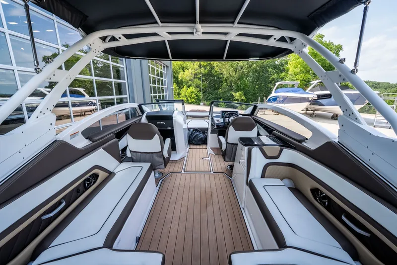 Slide: The Image of 2023 Yamaha Boats 275SE interior with sleek seating and modern design. - 9