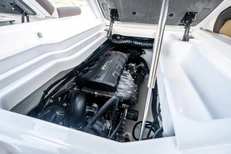 Slide: The Image of Engine compartment of 2023 Yamaha Boats 275SE, showcasing sleek design and advanced engineering. - 35