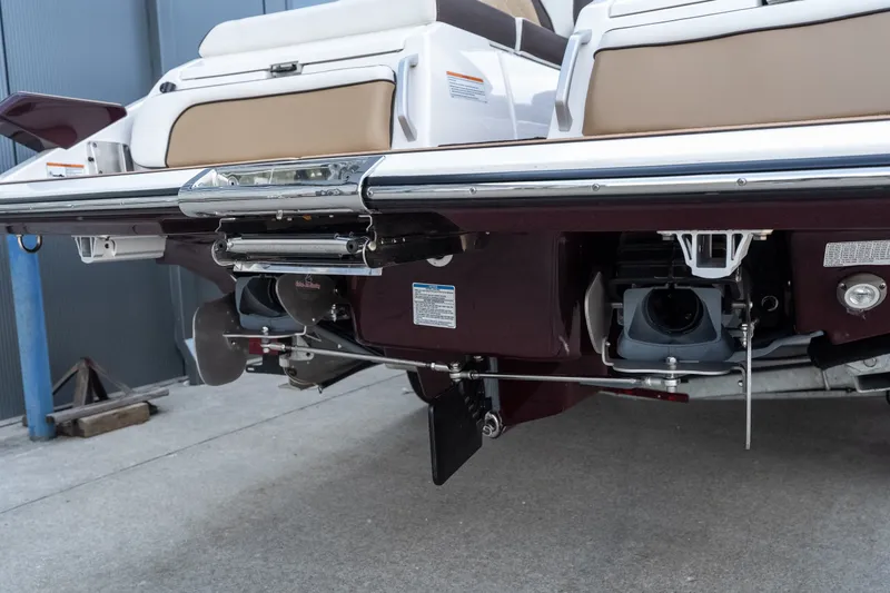 Slide: The Image of 2023 Yamaha Boats 275SE rear view showcasing dual jet propulsion system. - 4