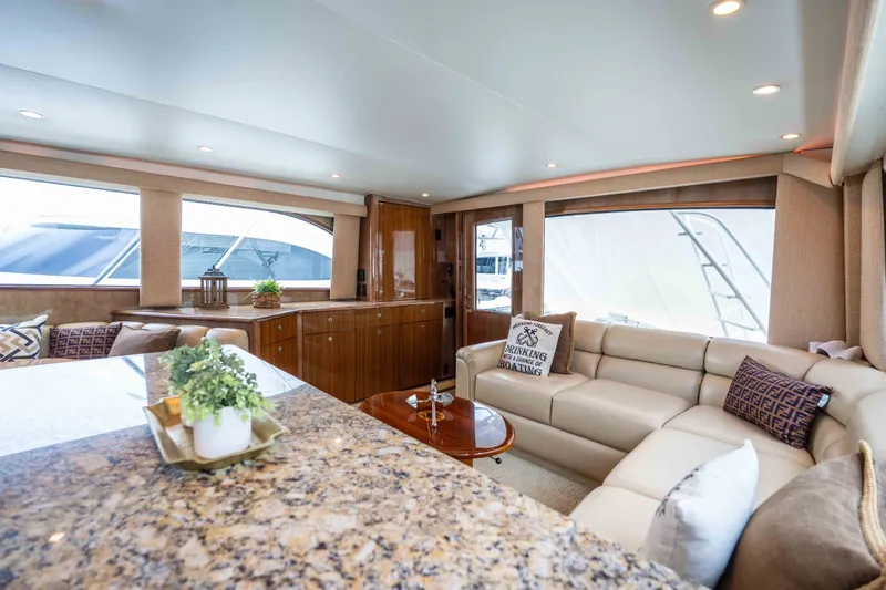 Slide: The Image of Luxurious interior of 2005 Viking 56 Convertible yacht with elegant seating and decor. - 4