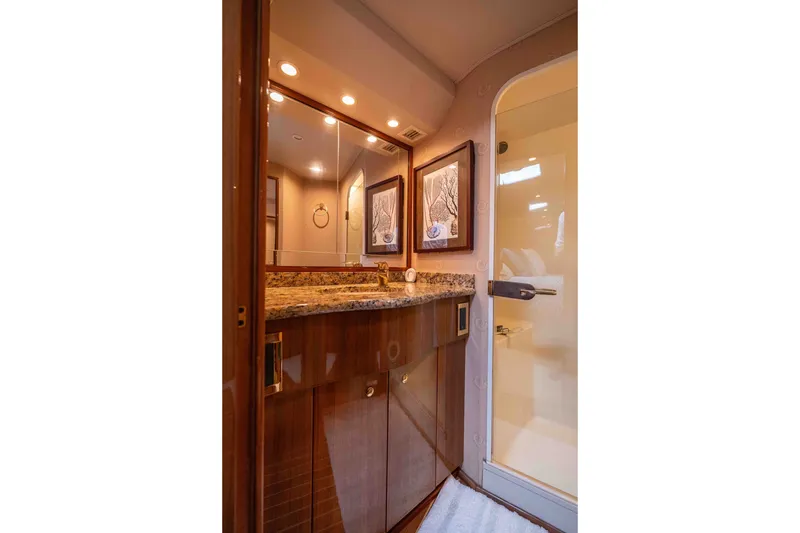 Slide: The Image of Luxurious bathroom interior of 2005 Viking 56 Convertible yacht with granite countertop and elegant decor. - 19