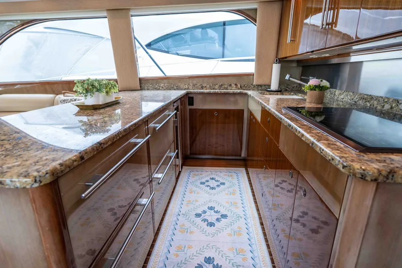 Slide: The Image of Luxurious kitchen interior of 2005 Viking 56 Convertible yacht with granite countertops. - 9