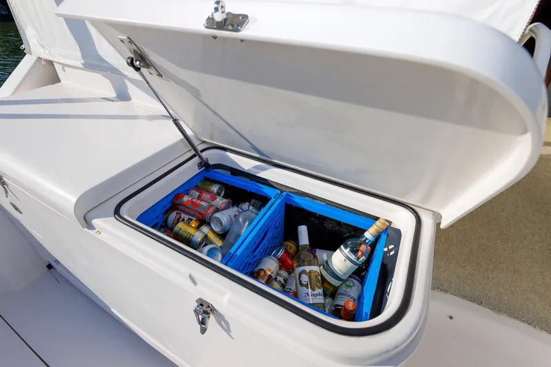 Slide: The Image of Open cooler on 2006 Cabo Yachts 40 Express, stocked with beverages and ice. - 12