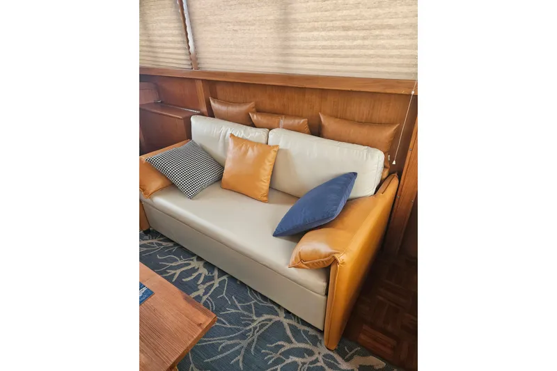 Slide: The Image of Cozy interior of 1986 Jefferson 42 SE Sundeck Motor Yacht with stylish cushions. - 12