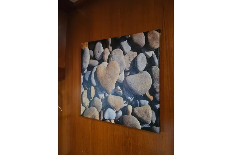 Slide: The Image of Framed pebble art on wooden wall inside 1986 Jefferson 42 SE Sundeck Motor Yacht. - 10