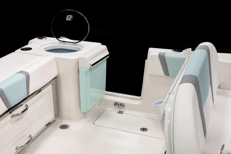 Slide: The Image of Manufacturer Provided Image: 2025 Robalo R250 Center Console interior with sleek seating and storage compartments. - 7