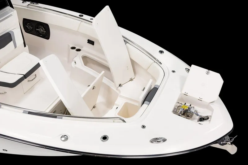 Slide: The Image of Manufacturer Provided Image: 2025 Robalo R300 Center Console boat with open storage compartments and seating. - 4
