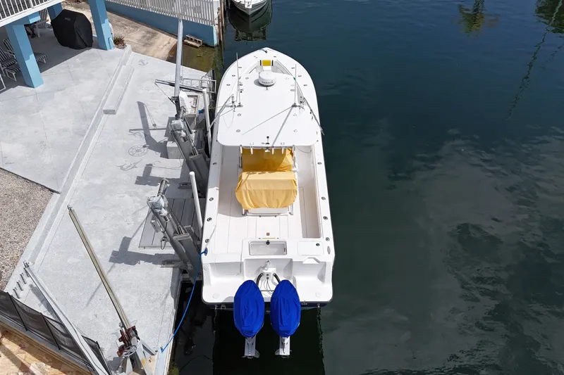 Slide: The Image of Aerial view of a 2006 SeaVee 340B boat docked at a marina. - 18