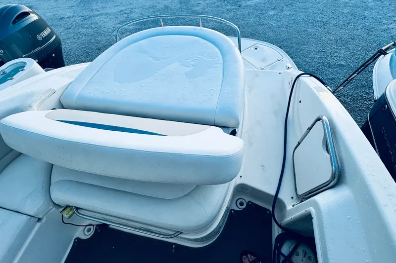 Slide: The Image of 2007 Chaparral 276 SSX boat with wet seating and Yamaha engine in background. - 14