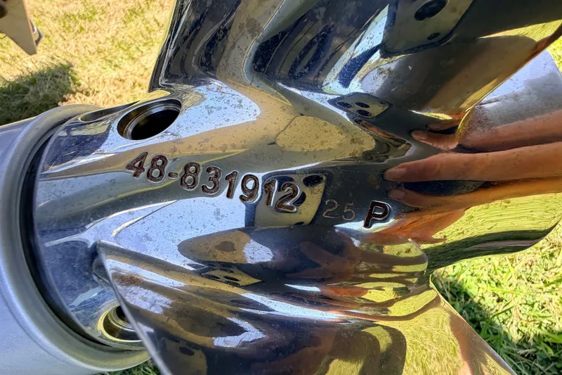 Slide: The Image of Close-up of a shiny boat propeller with engraved numbers, Chittum Skiffs Islamorada 21, 2021 model. - 18