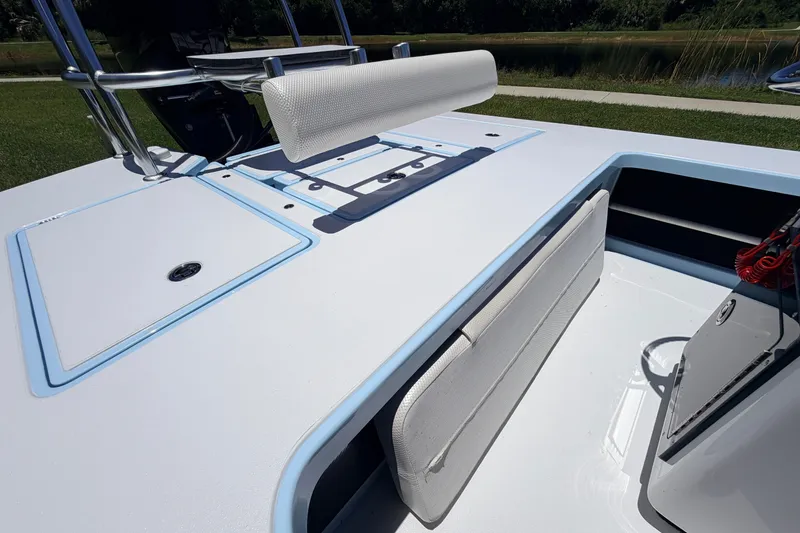 Slide: The Image of 2021 Chittum Skiffs Islamorada 21 boat interior with seating and storage compartments. - 55
