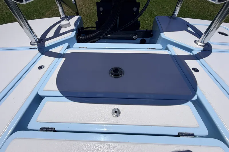 Slide: The Image of 2021 Chittum Skiffs Islamorada 21 boat deck with storage compartments. - 73