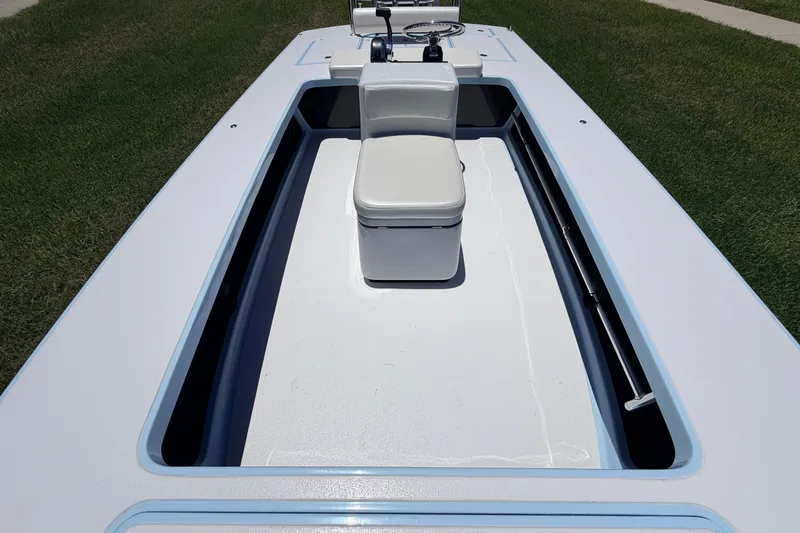 Slide: The Image of 2021 Chittum Skiffs Islamorada 21 boat interior with seating and steering console. - 33