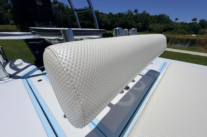 Slide: The Image of 2021 Chittum Skiffs Islamorada 21 boat seat with textured upholstery, outdoors. - 56