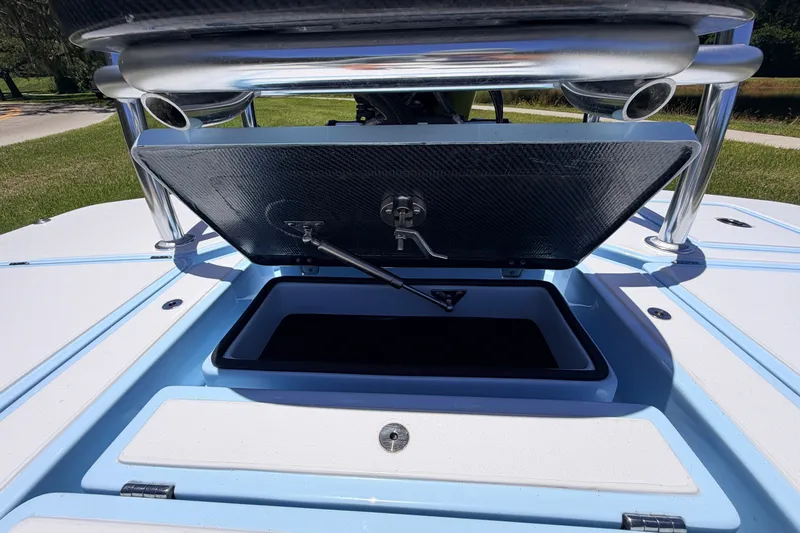 Slide: The Image of Open storage compartment on 2021 Chittum Skiffs Islamorada 21 boat deck. - 74