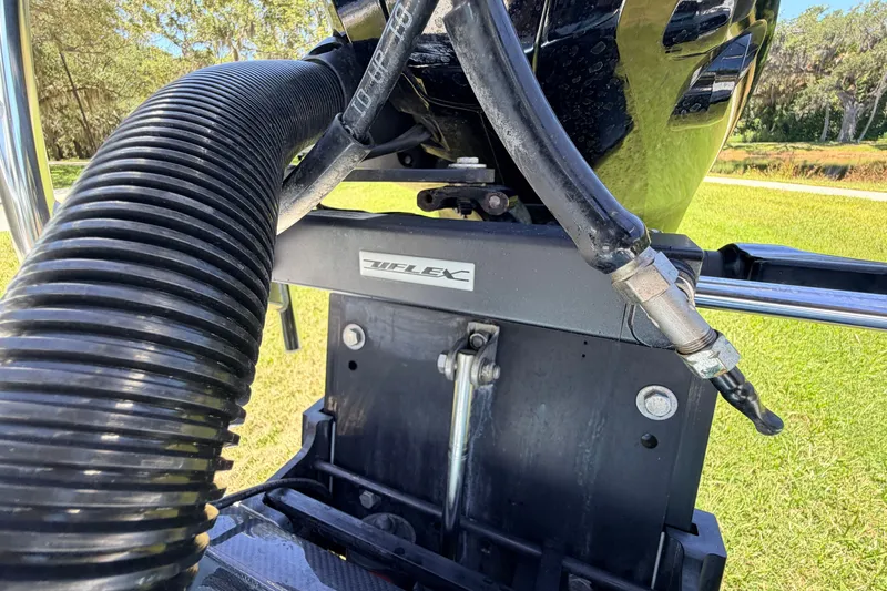 Slide: The Image of Close-up of 2021 Chittum Skiffs Islamorada 21 boat engine components. - 79
