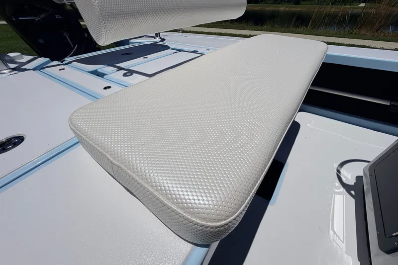 Slide: The Image of 2021 Chittum Skiffs Islamorada 21 boat seat with textured white upholstery. - 54