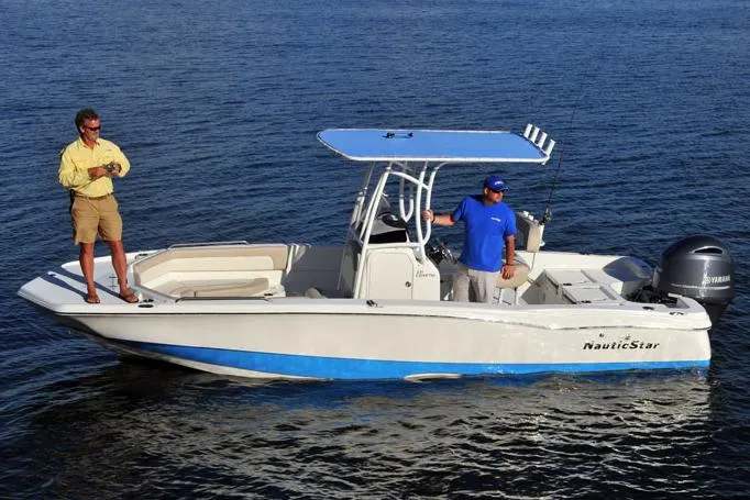 The Image of Manufacturer Provided Image: 2017 NauticStar 231 Coastal boat on water with two people onboard. - 7