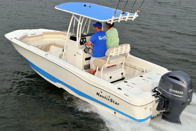 Slide: The Image of Manufacturer Provided Image: 2017 NauticStar 231 Coastal boat on water with Yamaha outboard motor. - 9